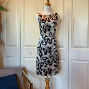 Beautiful black, cream, shimmery ivory animal print dress by and Taylor. Size 4.